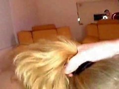 Daughter and mom take turns blowing