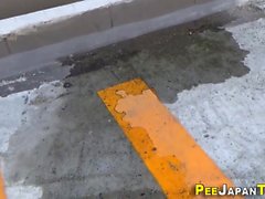 Kinky teens pee in street