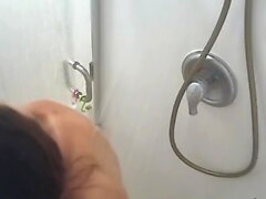 hot Japanese stepmom spied in the shower