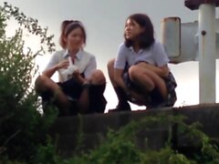 Cute asian teens squat