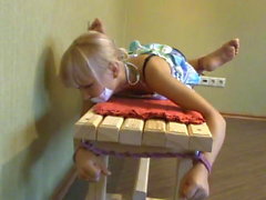 girl tied to table