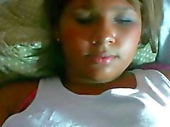 Chubby Latina teen on her webcam is rubbing her bald pussy