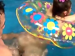 Bored oriental fucking in the pool