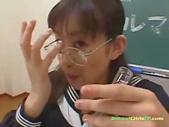 Schoolgirl With Glasses Sucking Guys In The Classroom