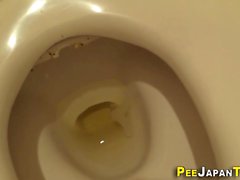 Hairy teen pees in toilet