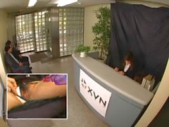 Japanese worker fingered under table