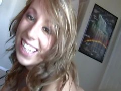 Sexy smile on a girl playing with cock