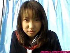 Japanese teen Kaori sucks dildo and sticks it under skirt